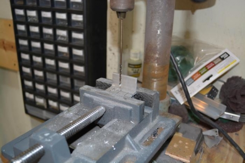 clamp up and align center hole for #40 size hole