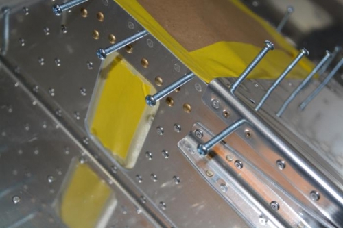 added hardware to keep paint out of threads of ~100 nutplates