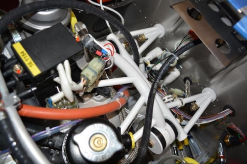 re-route pitot line under/through engine support