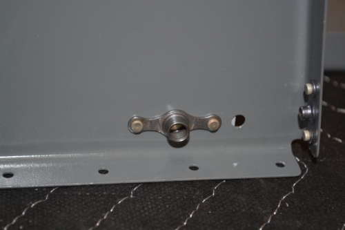 back side of strut attach angle with nut plate
