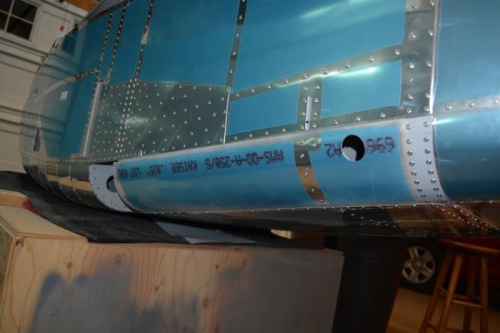 Left baggage corner skin attached