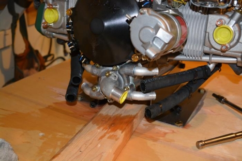 remove hoses...make sure to have rag handy