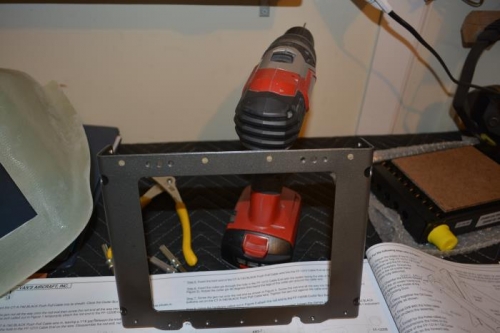 Top cover riveted in place