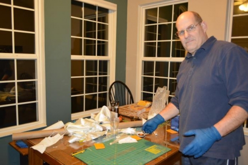 Fiberglass/plastic wrap sandwich