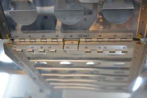 Seat located and hinge pins added