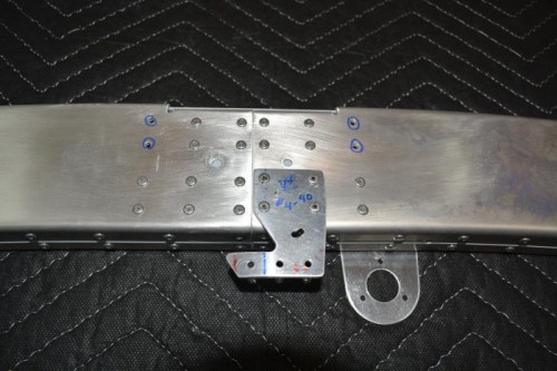 Splice plate and latch hook in place