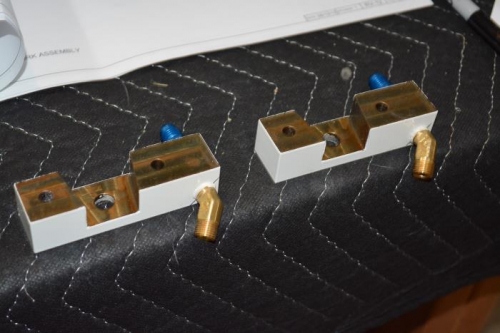 Inboard bracket with brake line fittings