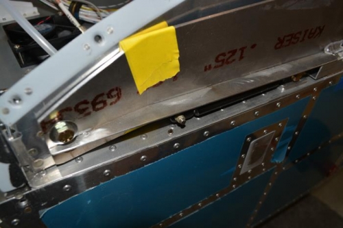 Left strut attached to canopy frame and fuselage