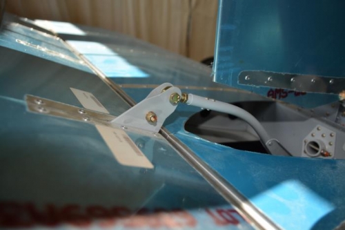 Attached trim motor to tabs