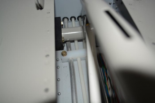 flap handle in place and clears fuel line