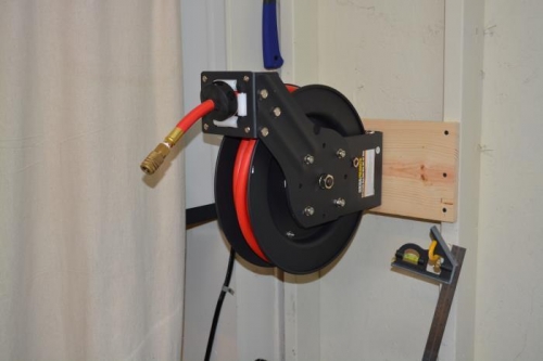 Rigged up hose reel for shop