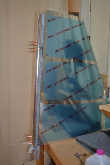 Temporay attach lower hinge and check fit