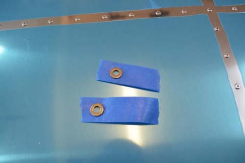 Painters tape to hold onto the washer while installing it into place