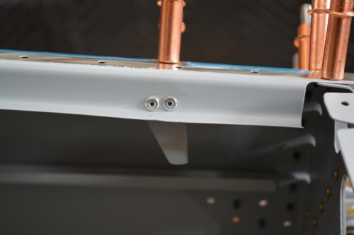 2nd try looks better, so I went ahead and rivetted in place