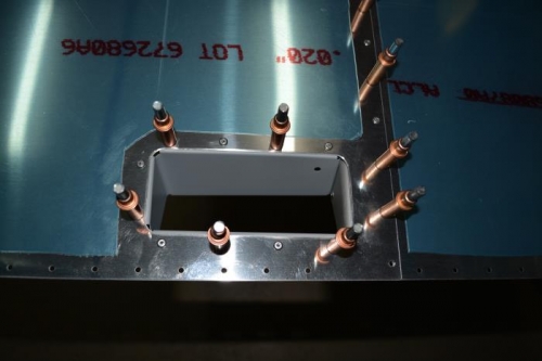 Started riveting to the spar and around the handle