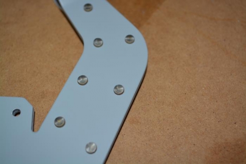 I flipped the direction of the rivets to mirror the look