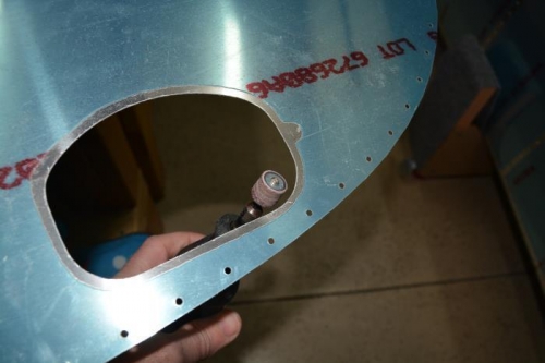 Cleaning up the edges with fine grit sanding drum