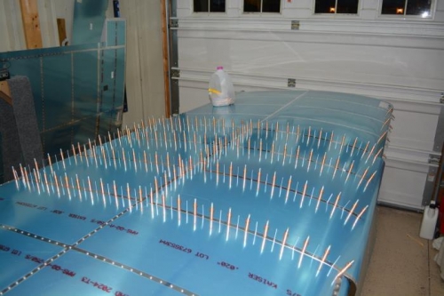 Attaching the last underside skin on right wing