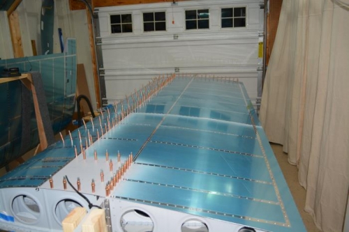 All the top skins installed.  Now ready to start wing walk doubler and finish up the leading edge.