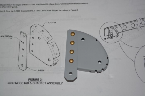 Primed and riveted inbd nose rib
