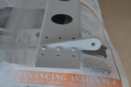 Pimed and riveted actuation bracket