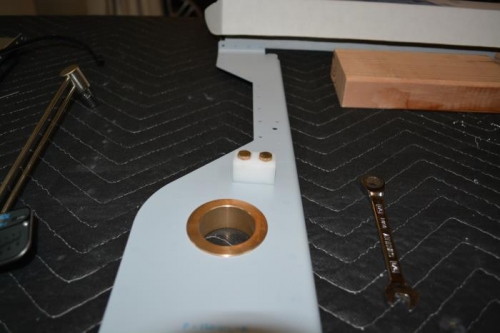 Attached retainer nylon block