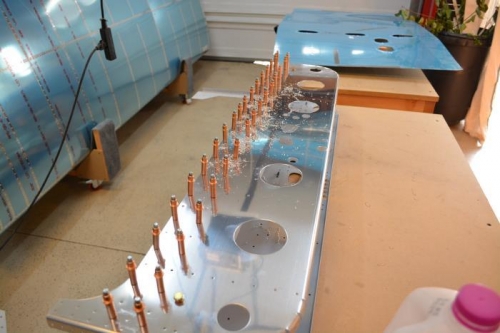 Enough holes drilled and clecoed to pull off the bottom skin