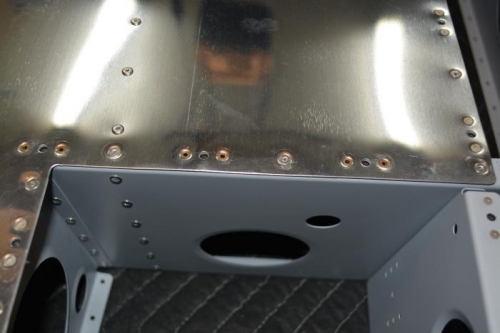 Riveted the countersunk locations along hte rear spar