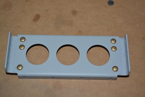 Bearing bracket falnges riveted in place