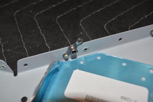 Rivet per teh instructions, then remove rivet per the instructions to make room for bolt