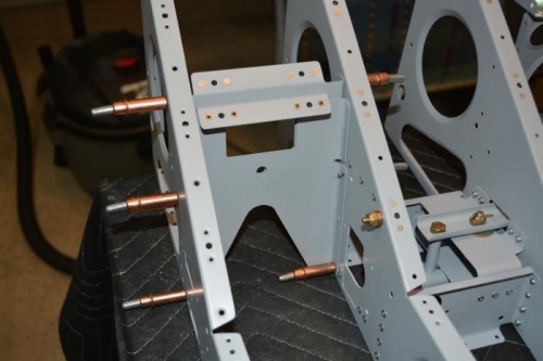 Left seat crotch bracket clecoed in place