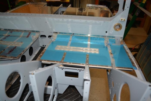 Left seat floor attached