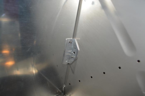 Bracket fabricated and inplace for final drilling