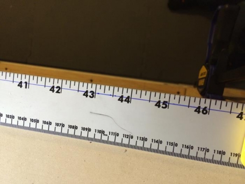 Ruler with marking for guide holes.