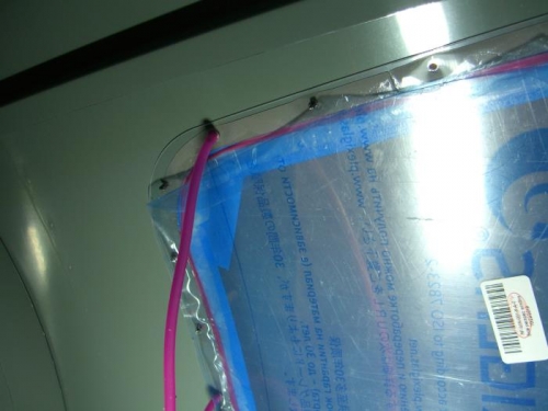 Holding washer in position with silicone tubing