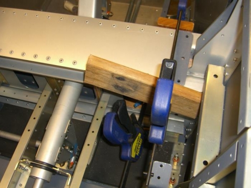 Main spar carry through spaced & clamped