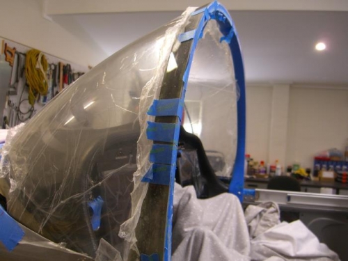 Holding it in place with tape