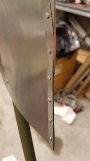 Riveting of lower vertical fin trailing edge