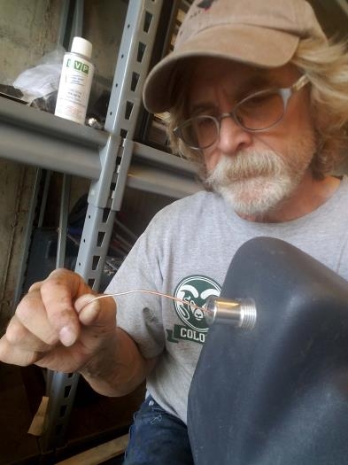 Feeding fittings through tank