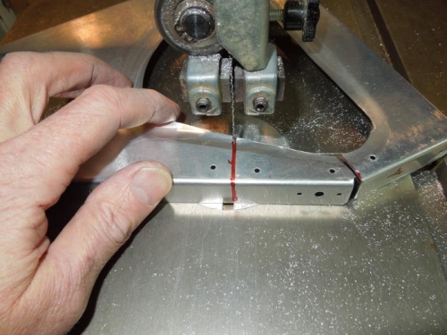 After making one cut I could position the band saw blade inside the ligthening hole