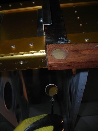 Centerline of the bracket visible through the spar holes with the mirror