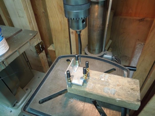 Drill both brackets on the drill press