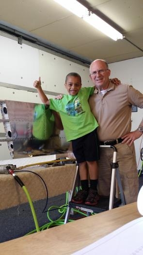 Axton helped by inserting rivets.