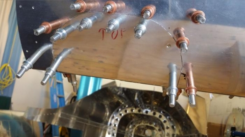 R wing landing light cover clekoed in place.