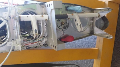 Wing root aileron controls