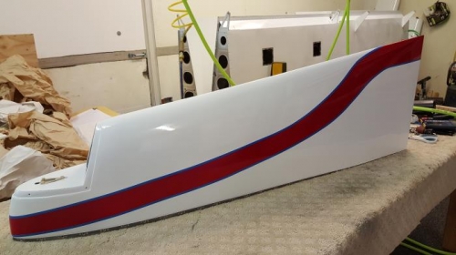 Wing tip with accent blue stripe