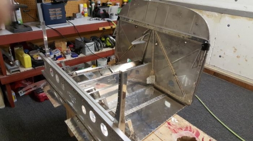 forward bulkhead attached to the firewall assembly