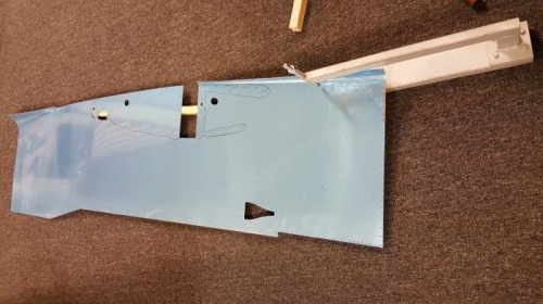 Dimpling a side skin