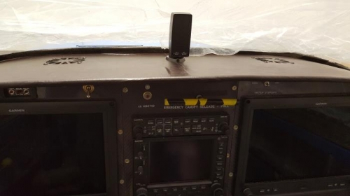 Glare shield cover glued in place.