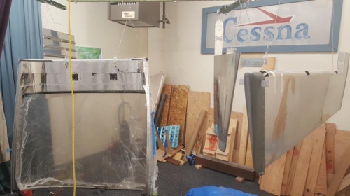 Rudder, vertical stabalized, canopy, and baggage aft fuselage door hung up for painting